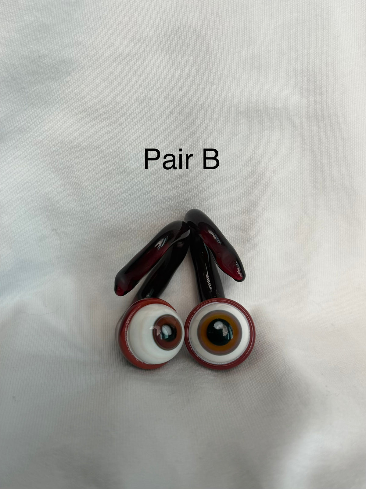 Eyeball ear weights